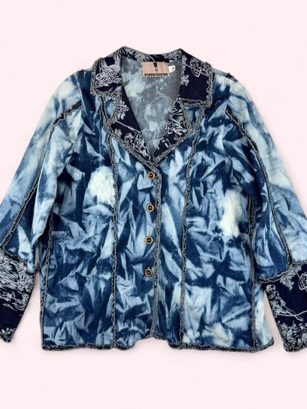 Blue jacket with tie-dye pattern and raw edge details
